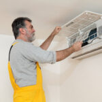 technician-checking-air-conditioning-system