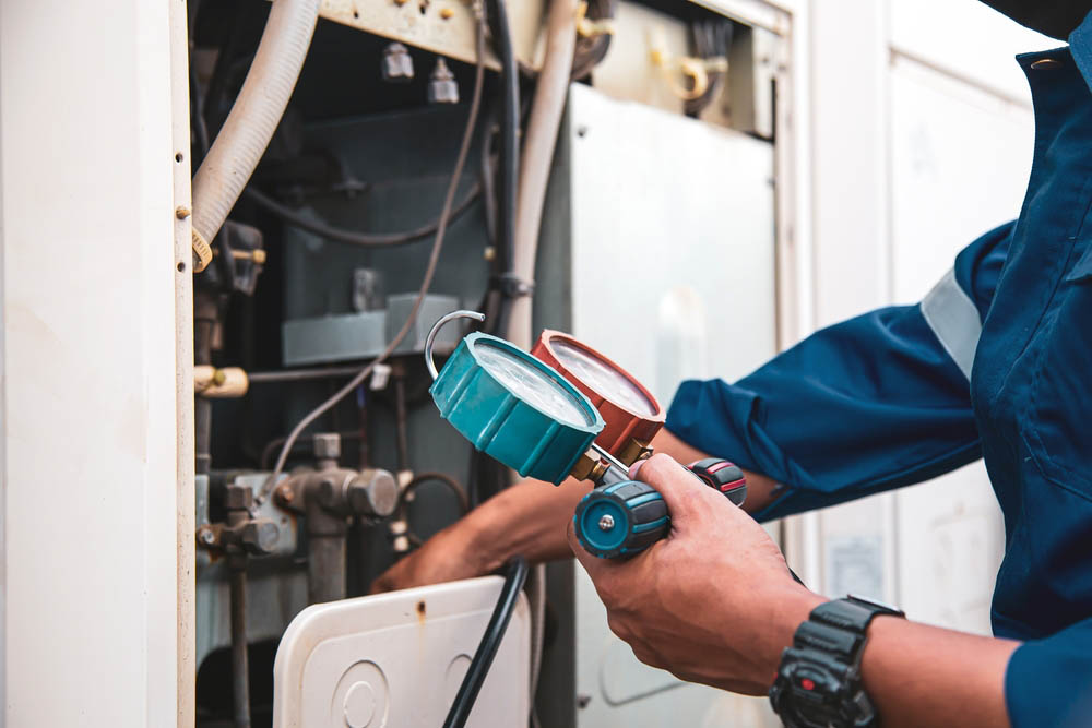 technician checking heater in St Petersburg, FL